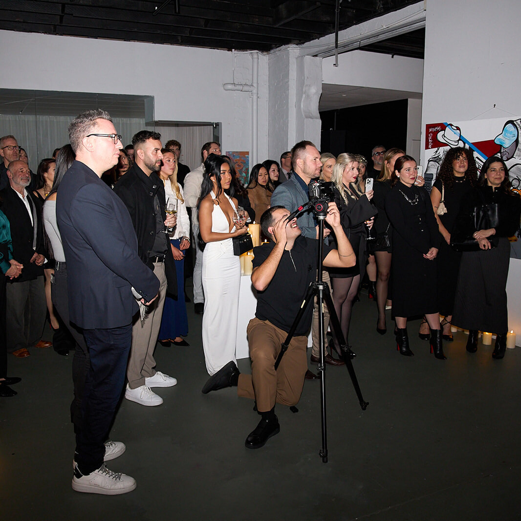 An opening night crowd in the gallery