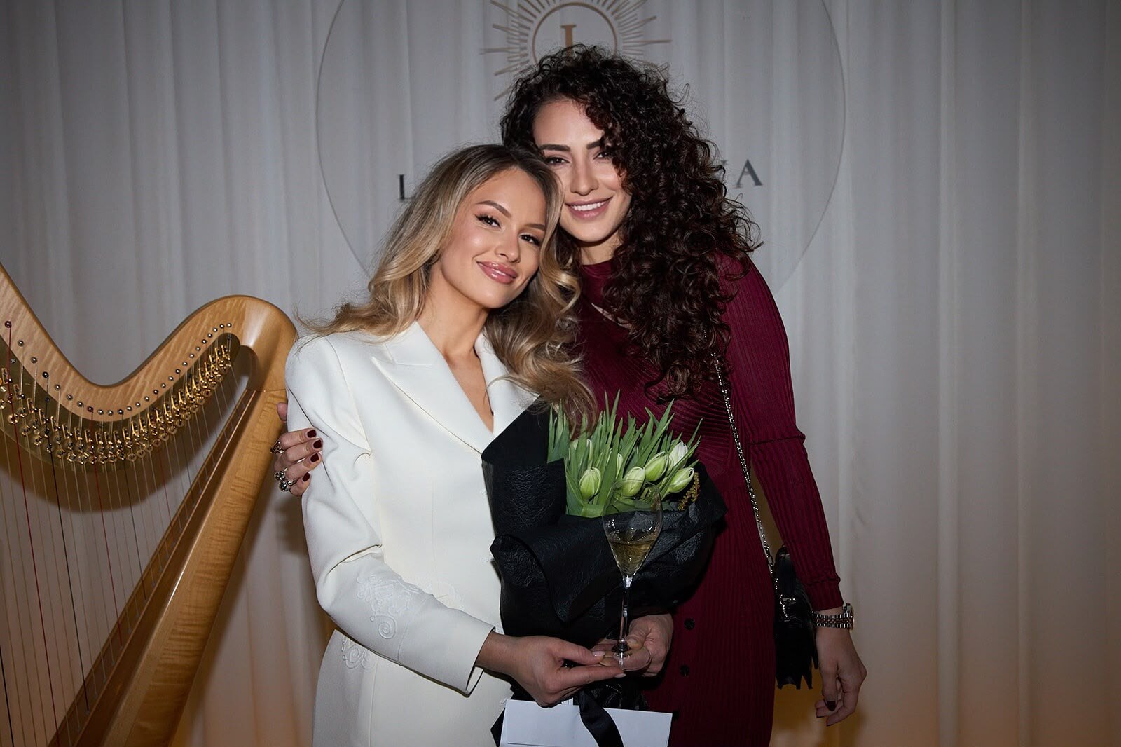 Two guests with tulips on launch night at La Vita Nova