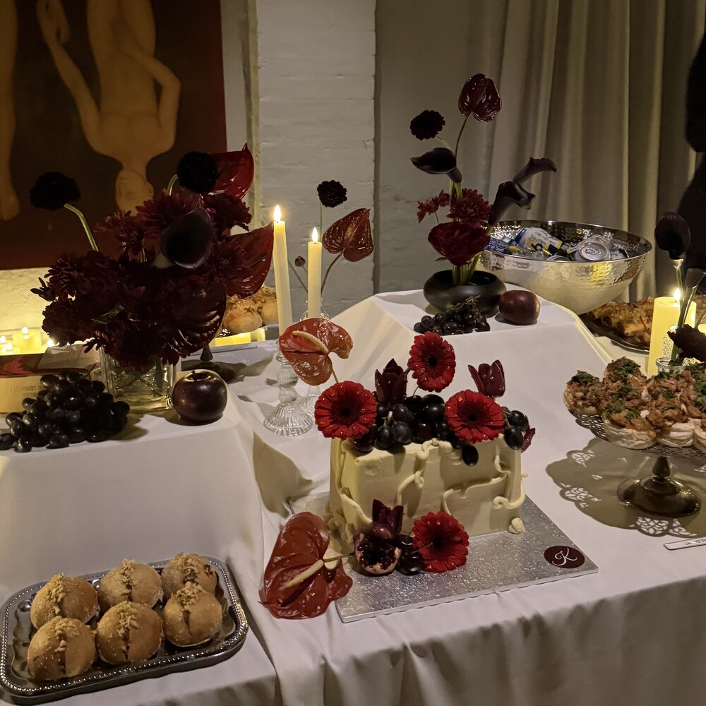 Dark florals and candlelight on the table